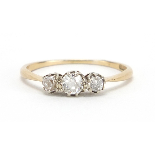 702 - 18ct gold diamond three stone ring, size Q, approximate weight 2.0g