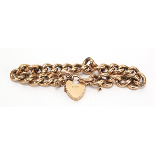 705 - 9ct gold bracelet with love heart shaped padlock, 18cm in length, approximate weight 17.4g