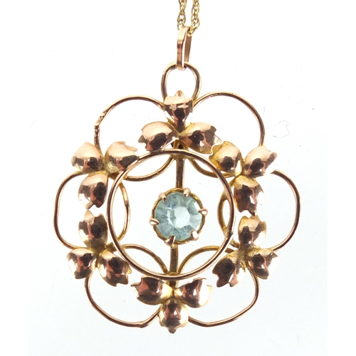 772 - Art Nouveau 9ct gold aquamarine pendant on a 9ct gold necklace, the pendant 2.5cm in diameter, appro... 