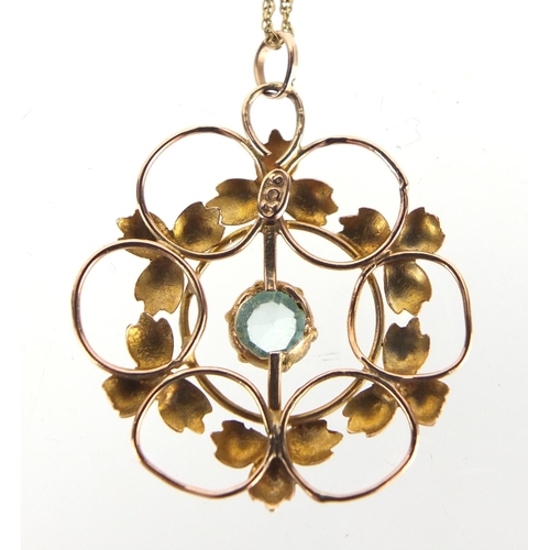 772 - Art Nouveau 9ct gold aquamarine pendant on a 9ct gold necklace, the pendant 2.5cm in diameter, appro... 