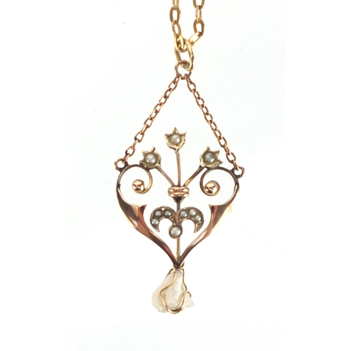 719 - Art Nouveau 9ct gold seed pearl pendant on a 9ct gold necklace, the pendant 4.7cm in length, approxi... 