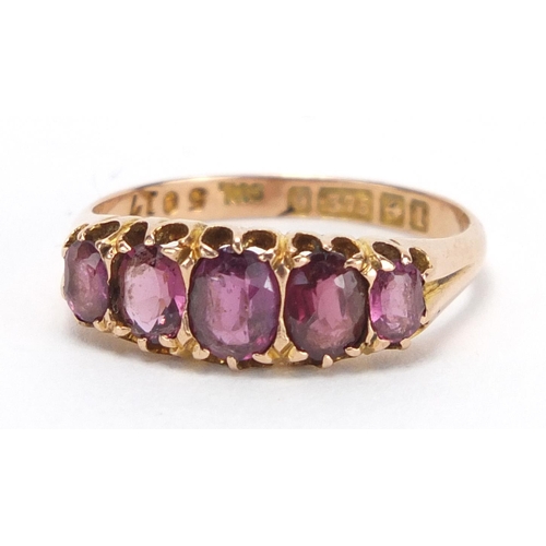 776 - 9ct gold garnet five stone ring, size O, approximate weight 2.3g