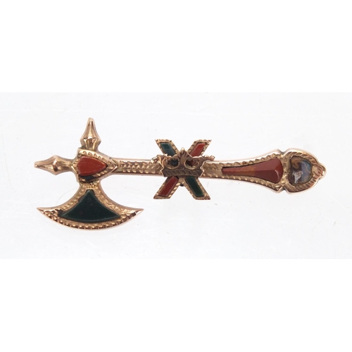 703 - Scottish unmarked gold battle axe brooch, set with hard stones, 5cm in length, approximate weight 3.... 