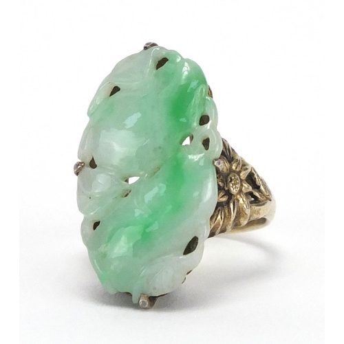 403 - Chinese silver and green jade ring carved with fruit amongst leaves, size O, approximate weight 7.6g