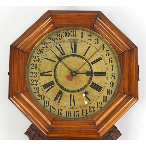 46 - Walnut cased wall hanging clock, with Roman and Arabic numerals, 78cm high