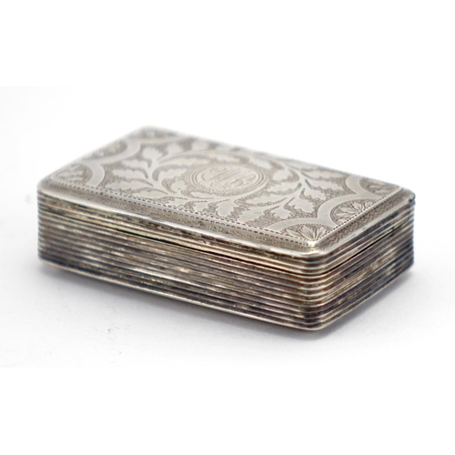 614 - Georgian silver snuff box, the hinged lid with floral chased decoration and gilt interior, Birmingha... 