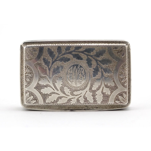 614 - Georgian silver snuff box, the hinged lid with floral chased decoration and gilt interior, Birmingha... 