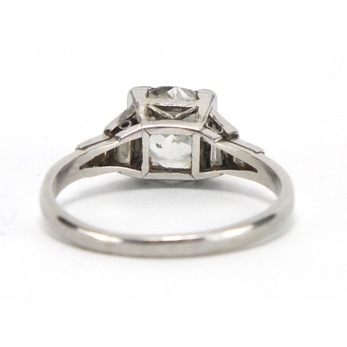 670 - Platinum diamond solitaire ring, with diamond set shoulders, size N, approximate weight 3.3g