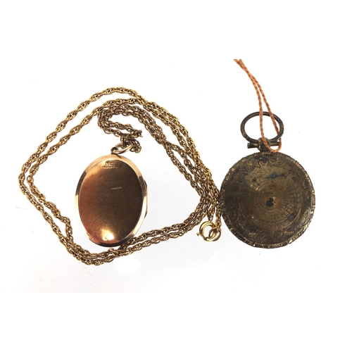 799 - 15ct gold back and front locket, set with a central diamond and a gilt metal mourning locket