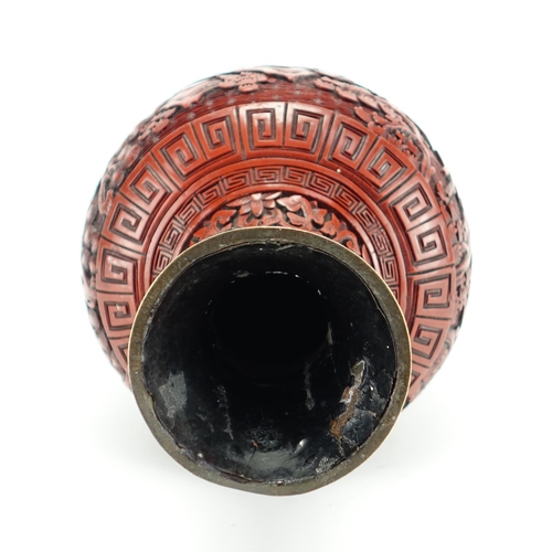 382 - Chinese cinnabar lacquer vase carved with figures in a landscape, 21.5cm high