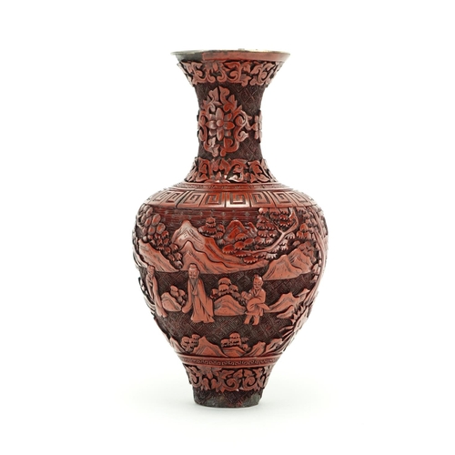 382 - Chinese cinnabar lacquer vase carved with figures in a landscape, 21.5cm high