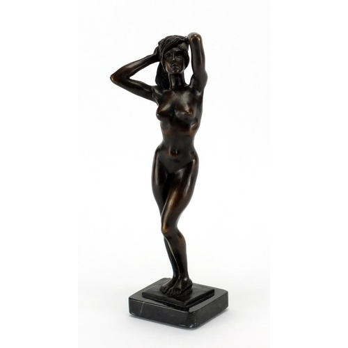 2099 - Ronald Cameron, patinated bronze study of a standing nude female, Friday Night, raised on a rectangu... 