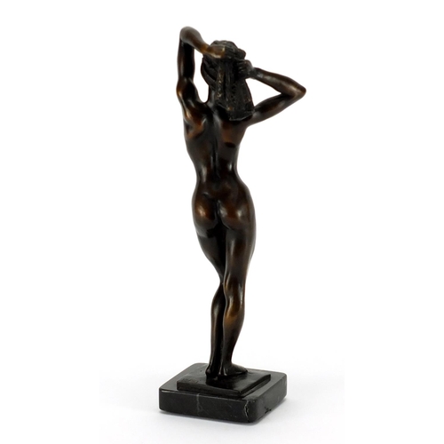 2099 - Ronald Cameron, patinated bronze study of a standing nude female, Friday Night, raised on a rectangu... 