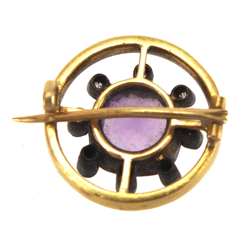701 - Unmarked gold amethyst, diamond and white enamel brooch, 1.6cm in diameter, approximate weight 4.4g