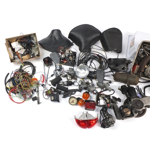 103 - Vintage motorcycle parts including seats, lights, indicators and wiring