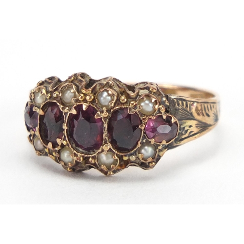 783 - Victorian 9ct gold garnet and seed pearl ring, size O, approximate weight 2.0g