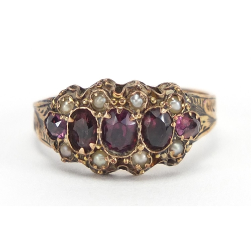 783 - Victorian 9ct gold garnet and seed pearl ring, size O, approximate weight 2.0g