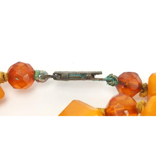 808 - Amber coloured bead necklace, 60cm in length, approximate weight 33.4g