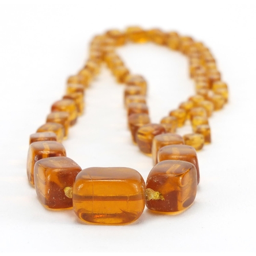 818 - Amber coloured graduated bead necklace, 80cm in length, approximate weight 67.0g