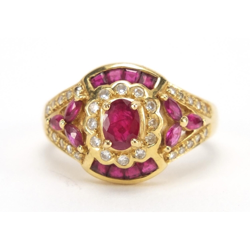 714 - 18ct gold ruby and diamond dress ring, housed in a Charles Fox Bournemouth tooled leather box, size ... 