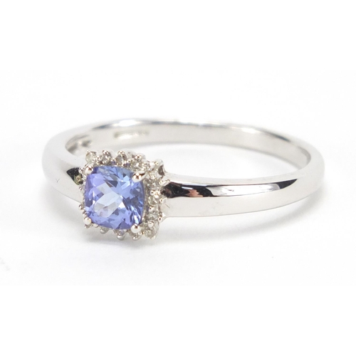693 - 18ct white gold tanzanite and diamond ring, housed in a tooled leather box, size U, approximate weig... 