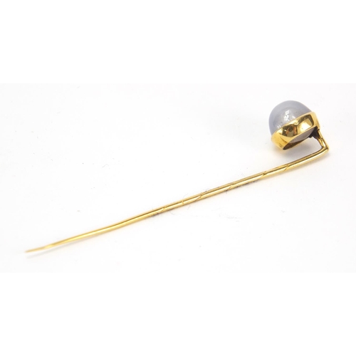 760 - Unmarked gold cabochon star sapphire tie pin, housed in a J W Benson London tooled leather box, 6.5c... 