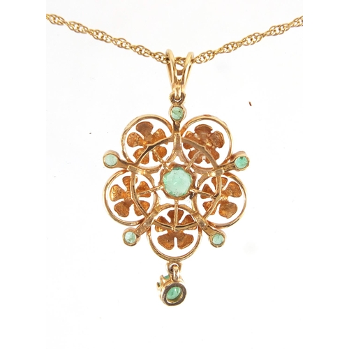 688 - 9ct gold emerald seed pearl pendant on a 9ct gold necklace, the pendant 3.7cm in length, approximate... 