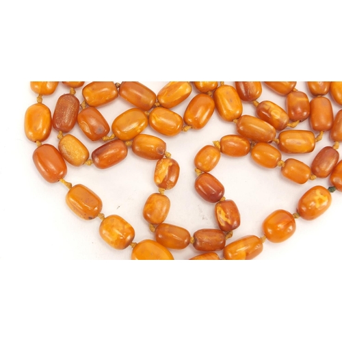 806 - Butterscotch amber coloured bead necklace, 110cm in length, approximate weight 62.0g