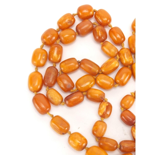 806 - Butterscotch amber coloured bead necklace, 110cm in length, approximate weight 62.0g