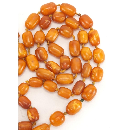 806 - Butterscotch amber coloured bead necklace, 110cm in length, approximate weight 62.0g