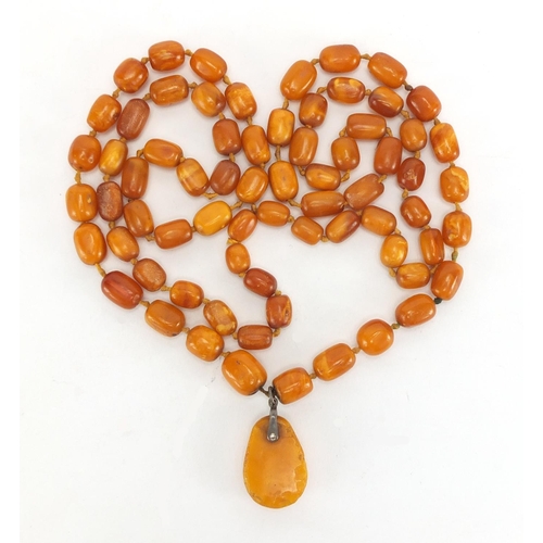 806 - Butterscotch amber coloured bead necklace, 110cm in length, approximate weight 62.0g