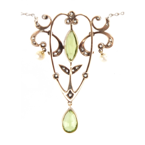 669 - Art Nouveau unmarked gold diamond, peridot and seed pearl necklace, housed in a Stewart Dawson & Com... 
