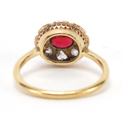 742 - 18ct gold garnet and diamond ring, size O, approximate weight 3.1g