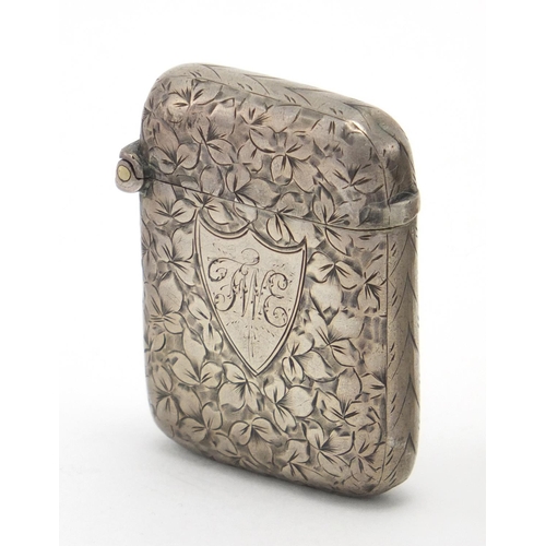 615 - Five rectangular silver vesta's with engraved floral decoration, Birmingham hallmarks, the largest 4... 