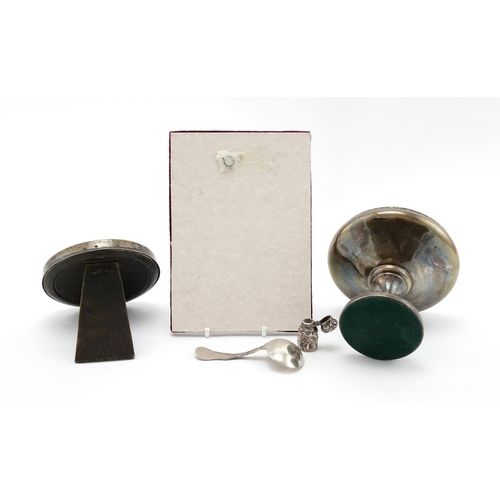 647 - Georgian and later silver objects including miniature scent bottle, pedestal dish, photo frame and c... 
