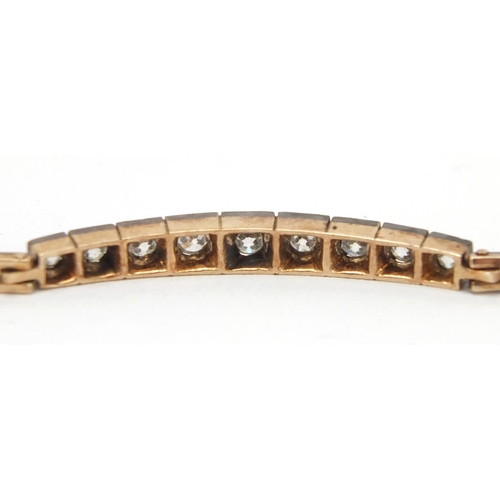 674 - Antique gold diamond nine stone bracelet, the clasp marked 585, 17cm in length, approximate weight 8... 