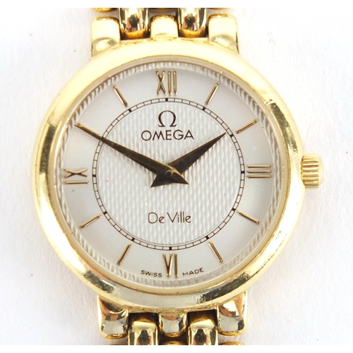 848 - Ladies 18ct gold Omega Deville wristwatch with 18ct gold strap, the case numbered 56643398, with rel... 