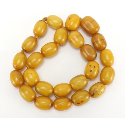 809 - Amber coloured bead necklace, 56cm in length, approximate weight 146.5g