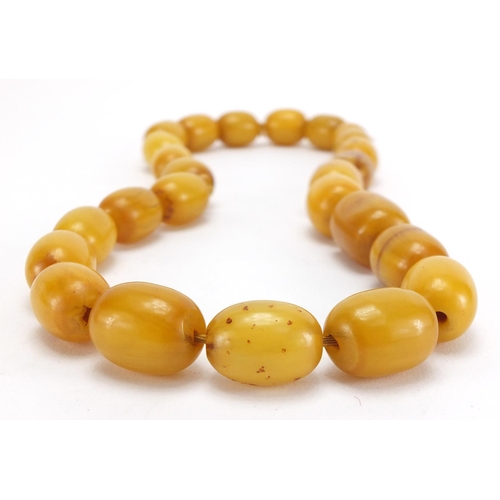 809 - Amber coloured bead necklace, 56cm in length, approximate weight 146.5g