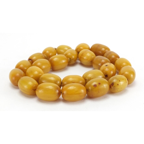 809 - Amber coloured bead necklace, 56cm in length, approximate weight 146.5g