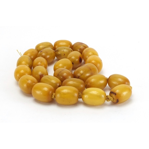 809 - Amber coloured bead necklace, 56cm in length, approximate weight 146.5g