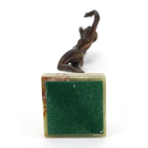 567 - Patinated bronze study of a nude Art Deco female raised on a green onyx base, 25cm high