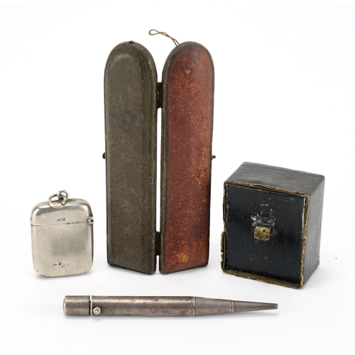 42 - Miscellaneous objects comprising a silver vesta, Parker's pointer pencil, leather cased travel clock... 