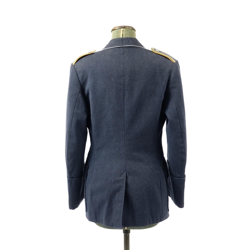 229 - German Military interest tunic with cloth patch and badges including a wounds badge, the interior st... 