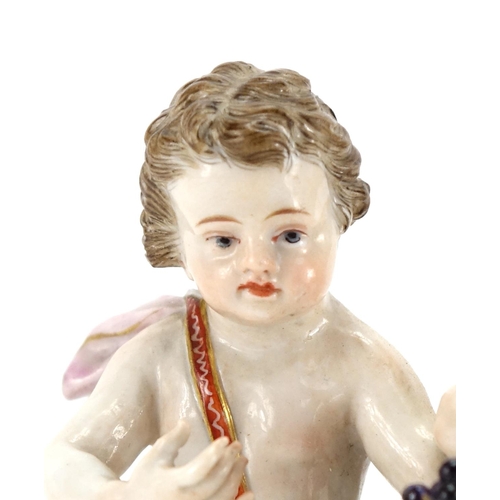 484 - 19th century Meissen hand painted porcelain figure group of two putti holding a wreath with a bird, ... 