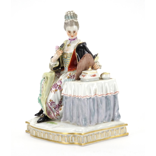 485 - 19th century Meissen hand painted porcelain figurine of a female seated at a dressing table, blue cr... 