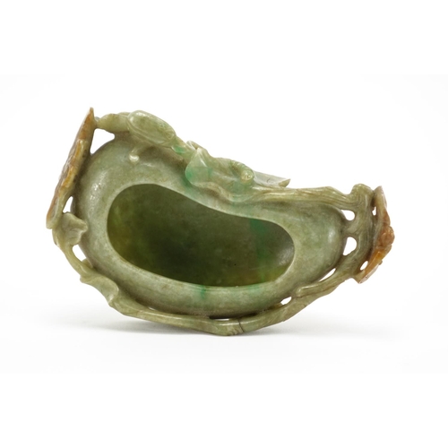 393 - Chinese green and russet jade naturalistic brush washer, carved with a bat and butterfly, 14cm wide