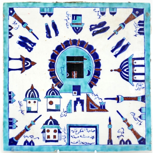 452 - Islamic square tile hand painted with Minarets, buildings and script, 30cm x 29.5cm (PROVENANCE: Fro... 