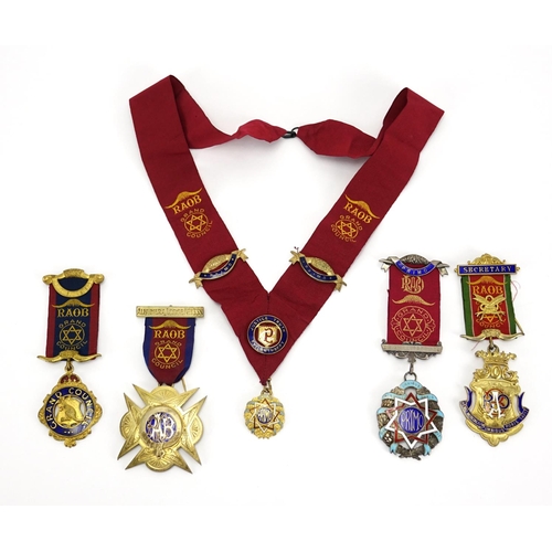 187 - Four Royal Order of Buffalos jewels and a sash including three silver and enamel presented to C Croc... 