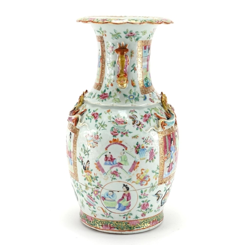 296 - Chinese porcelain Canton vase with twin handles and relief dragon decoration, finely hand painted in... 